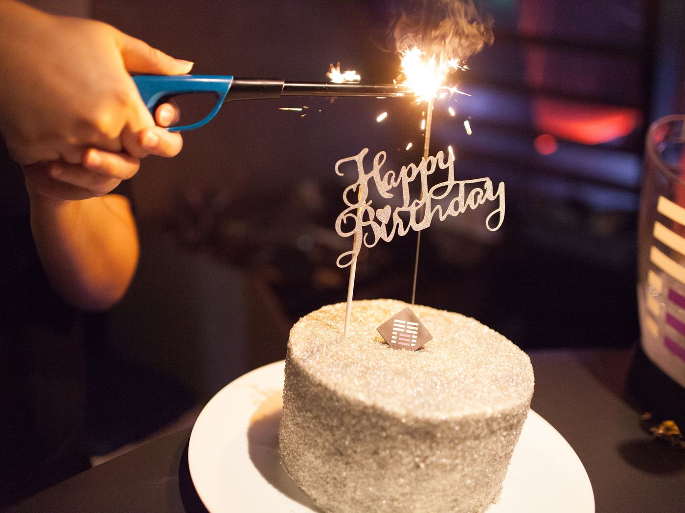 A birthday cake with a sparkler