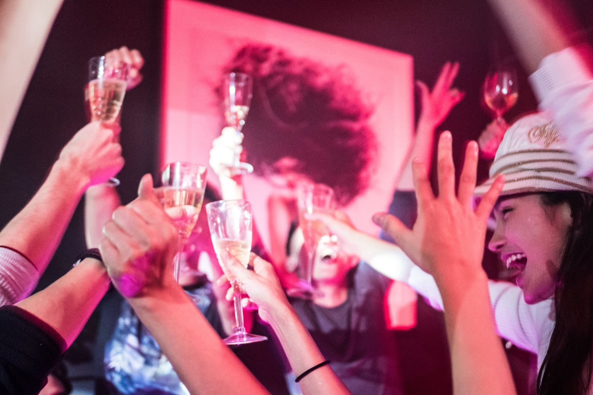 Guests raising champagne glasses at Powder Room Niseko